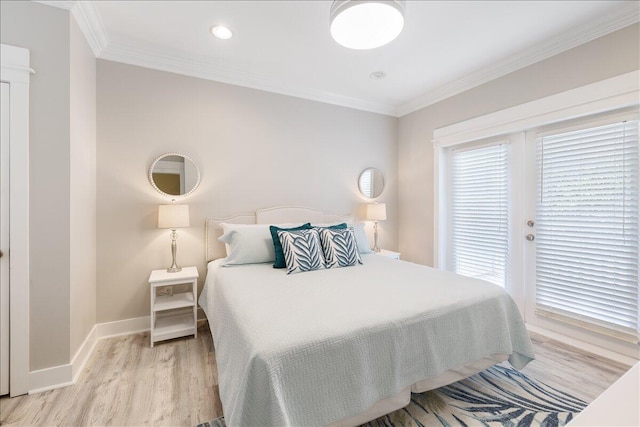 bedroom featuring light hardwood / wood-style flooring and ornamental molding