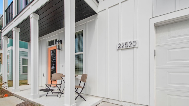 doorway to property with covered porch