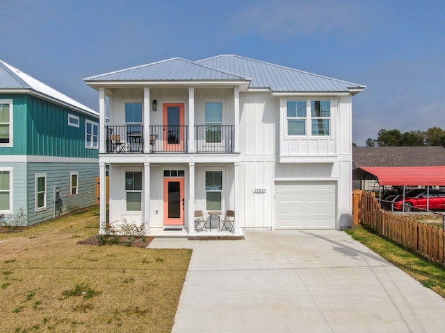 view of front facade featuring covered porch, a garage, a balcony, a carport, and a front lawn