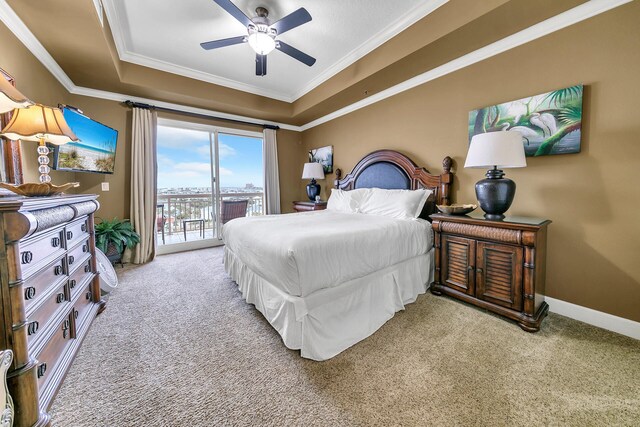 bedroom with light colored carpet, baseboards, access to exterior, a raised ceiling, and crown molding