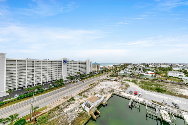 bird's eye view featuring a water view and a city view