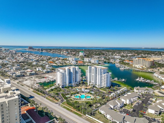 drone / aerial view featuring a water view and a city view