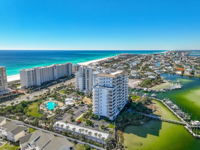 birds eye view of property featuring a water view and a view of the beach