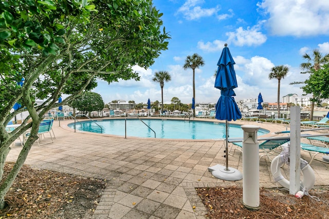 pool with a patio area