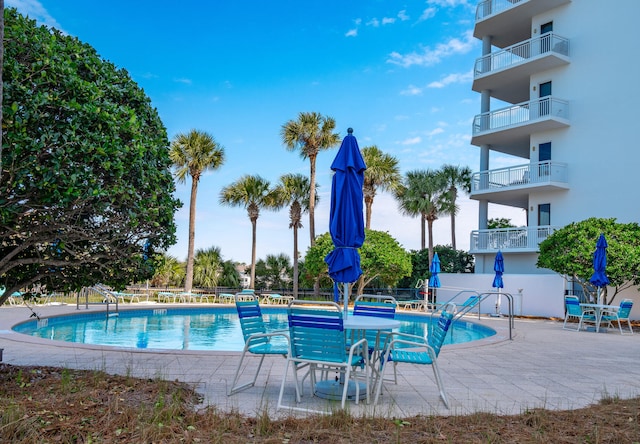 view of pool with a patio