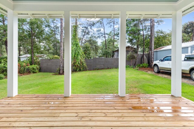 unfurnished sunroom with a healthy amount of sunlight