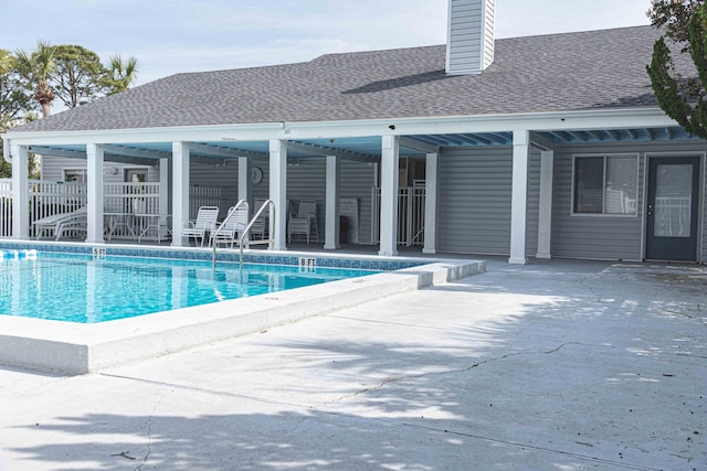 view of pool featuring a patio