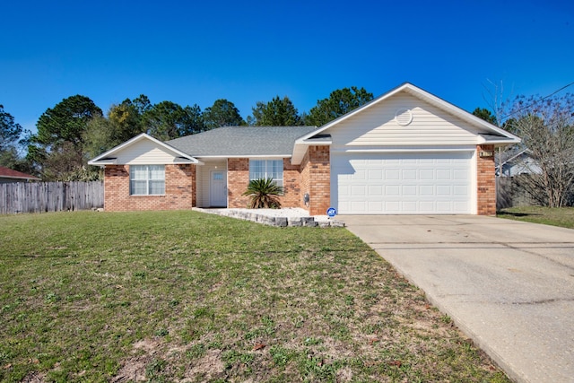 ranch-style home featuring a garage and a front yard