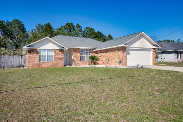 ranch-style home with a front yard and a garage