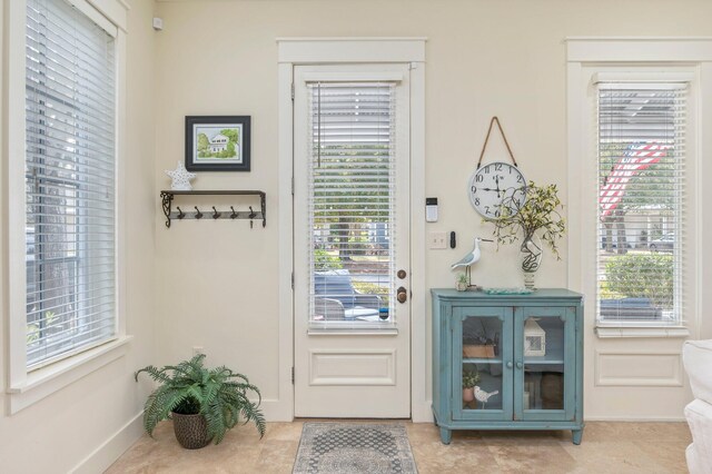 entryway featuring light tile flooring