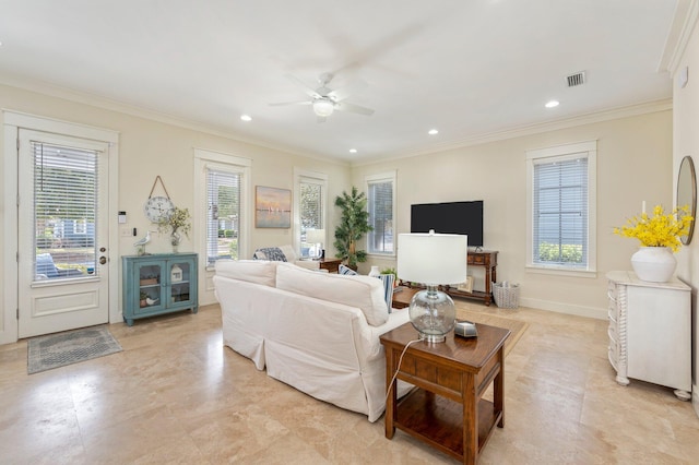 tiled living room with ornamental molding and ceiling fan