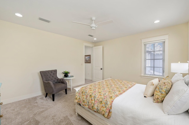 bedroom featuring light colored carpet and ceiling fan