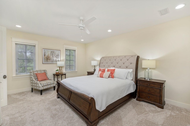 carpeted bedroom with ceiling fan