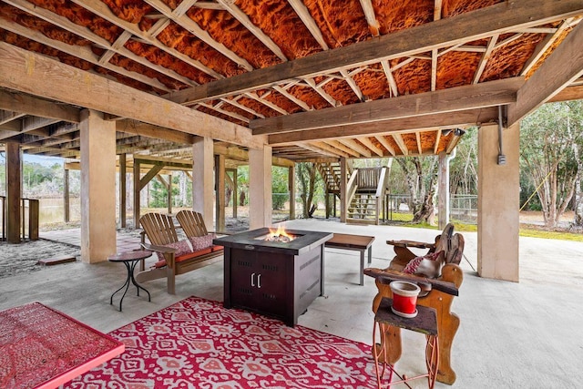 view of patio with a fire pit