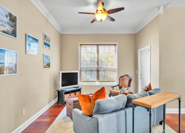 living room featuring ornamental molding, dark hardwood / wood-style flooring, and ceiling fan