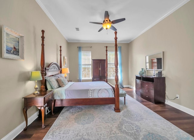 bedroom with dark hardwood / wood-style flooring, ceiling fan, and crown molding