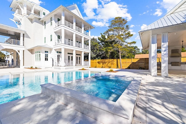 view of pool featuring a patio