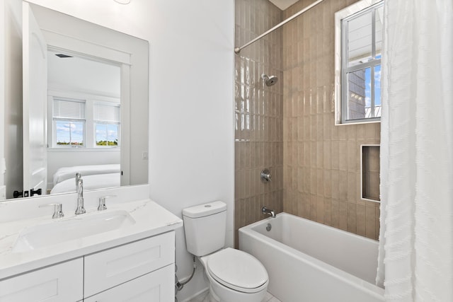 full bathroom featuring shower / bathtub combination with curtain, toilet, and large vanity