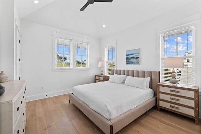 bedroom featuring ceiling fan and light hardwood / wood-style floors