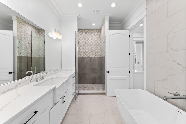 bathroom with ornamental molding, shower with separate bathtub, tile floors, and vanity