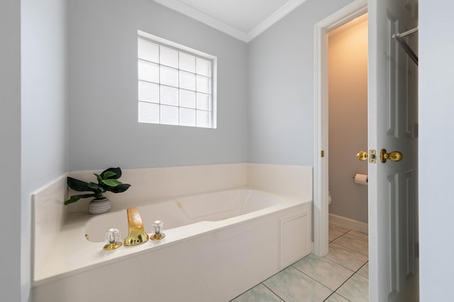 bathroom featuring crown molding, a bathing tub, and tile patterned flooring