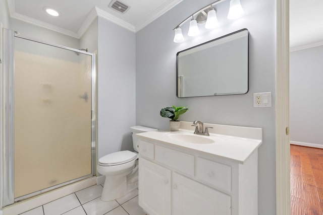 bathroom featuring vanity, an enclosed shower, ornamental molding, and toilet