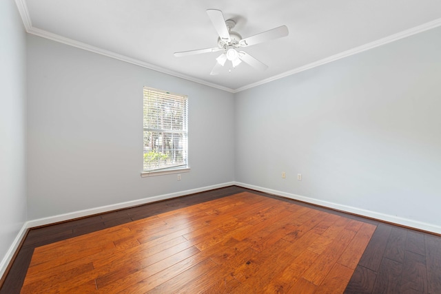 spare room featuring hardwood / wood-style floors, crown molding, and ceiling fan