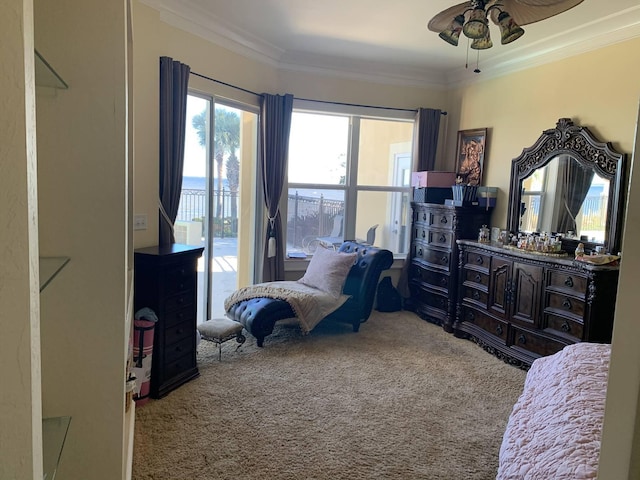 bedroom with carpet flooring, access to outside, ceiling fan, and ornamental molding