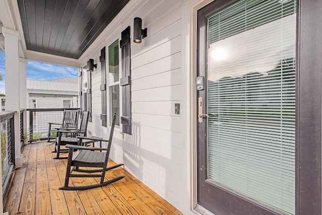 balcony featuring a porch