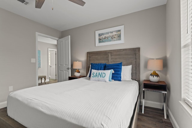 bedroom featuring ceiling fan and dark hardwood / wood-style flooring