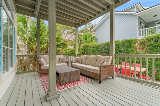 wooden deck with outdoor lounge area