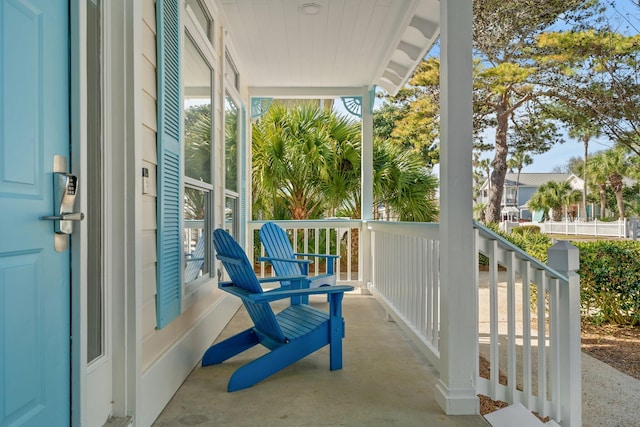 balcony featuring covered porch