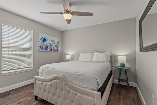 bedroom featuring ceiling fan and dark wood-type flooring