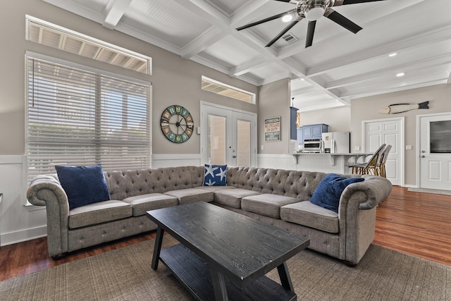 living room with beamed ceiling, french doors, dark hardwood / wood-style flooring, coffered ceiling, and ceiling fan