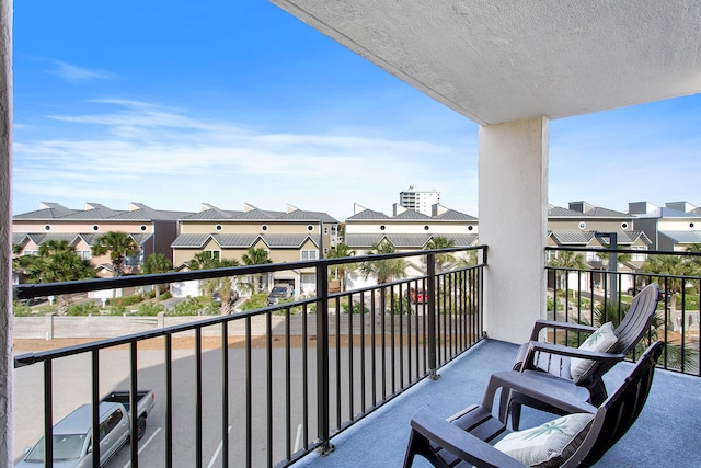 balcony featuring a residential view