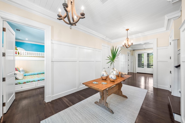 interior space with french doors, dark hardwood / wood-style floors, and an inviting chandelier