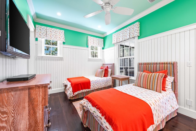 bedroom featuring crown molding, ceiling fan, and dark hardwood / wood-style floors