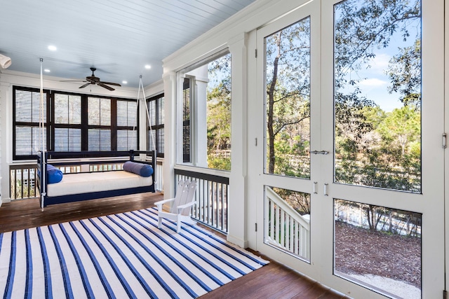 sunroom / solarium with ceiling fan and a wealth of natural light