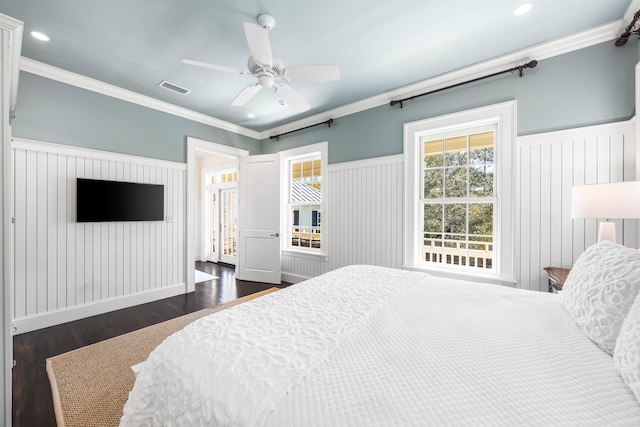 bedroom with ornamental molding, french doors, ceiling fan, and dark hardwood / wood-style floors