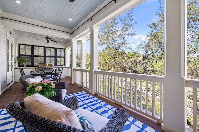 balcony with ceiling fan, an outdoor hangout area, and area for grilling