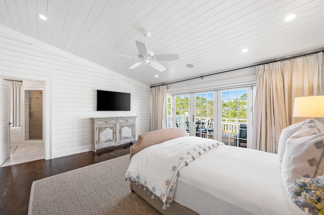 bedroom with dark hardwood / wood-style flooring, connected bathroom, access to exterior, ceiling fan, and lofted ceiling