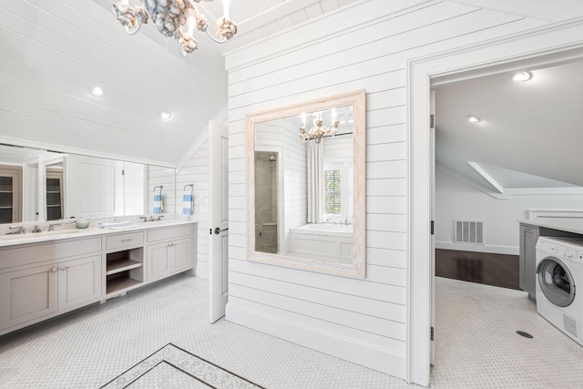 bathroom with a chandelier, wooden walls, washer / clothes dryer, and walk in shower