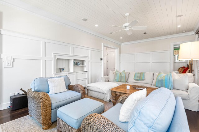 living room featuring wood ceiling, ceiling fan, crown molding, and dark wood-type flooring