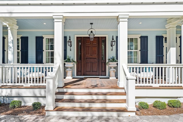 doorway to property with covered porch