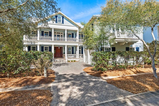 view of front of property with a balcony