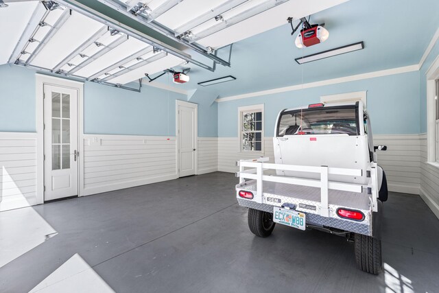 garage featuring a garage door opener