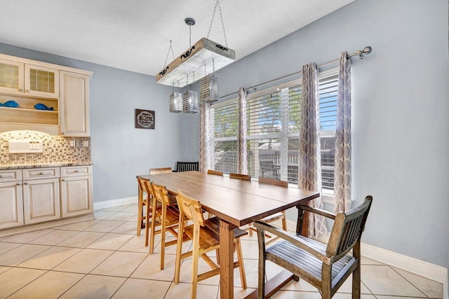 dining area with light tile floors