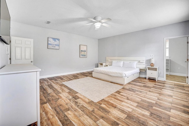 unfurnished bedroom with light hardwood / wood-style floors and ceiling fan