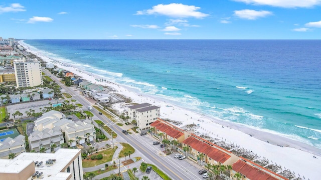 bird's eye view featuring a water view and a view of the beach