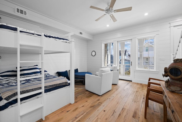 interior space with ceiling fan and light wood-type flooring